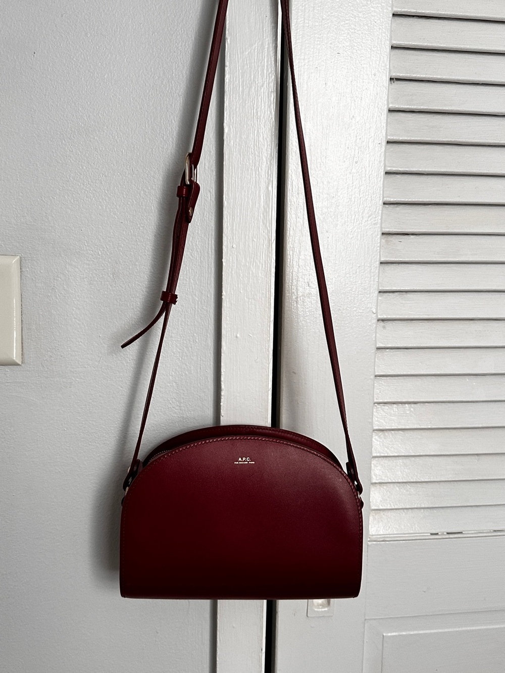 A.P.C. Demi-Lune Crossbody Bag in Burgundy